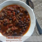 taco soup with beans, tomatoes, hamburger and cheese