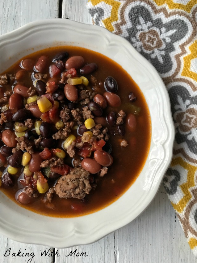 So Easy Taco Soup-made in minutes, cooks in crock pot. Hamburger, corn, tomatoes