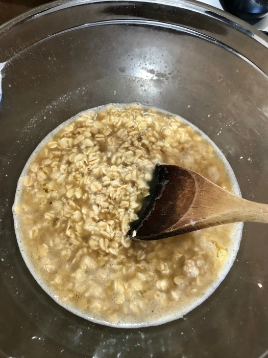 Oatmeal and brown sugar in mixing bowl