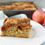 apple coffee cake on a white plate.