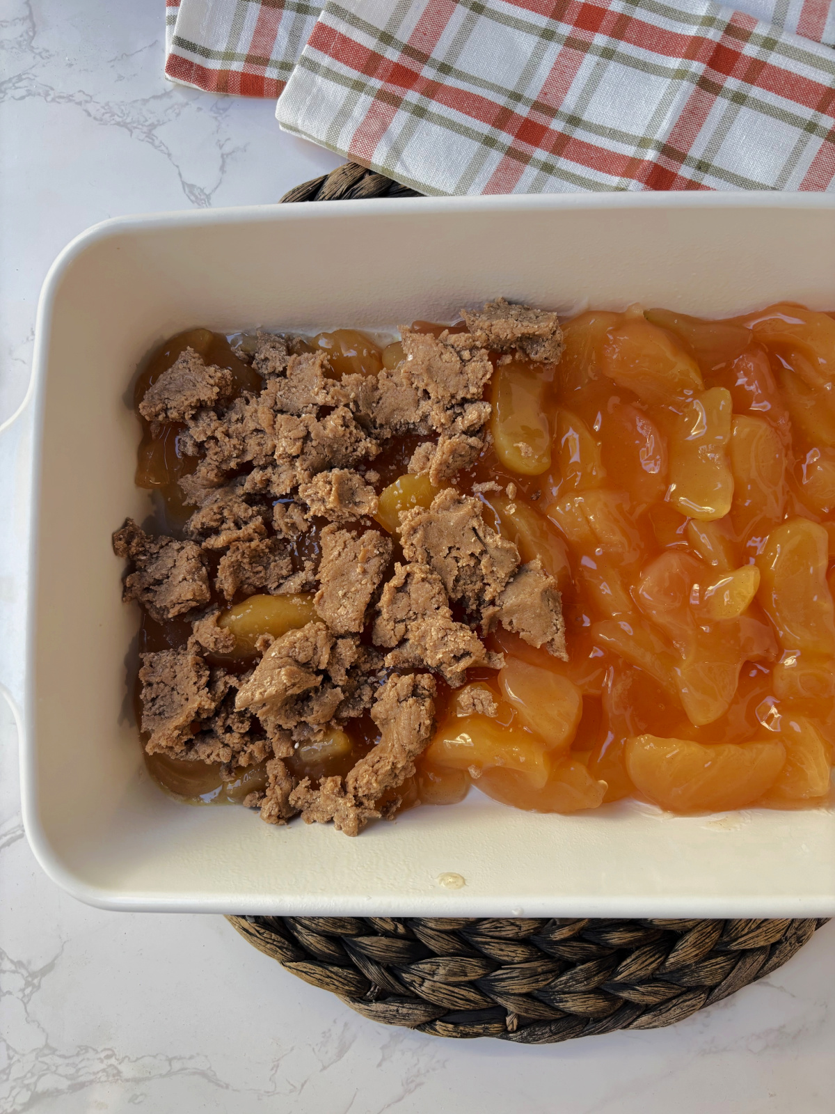 apple pie filling with spice cake on top. 