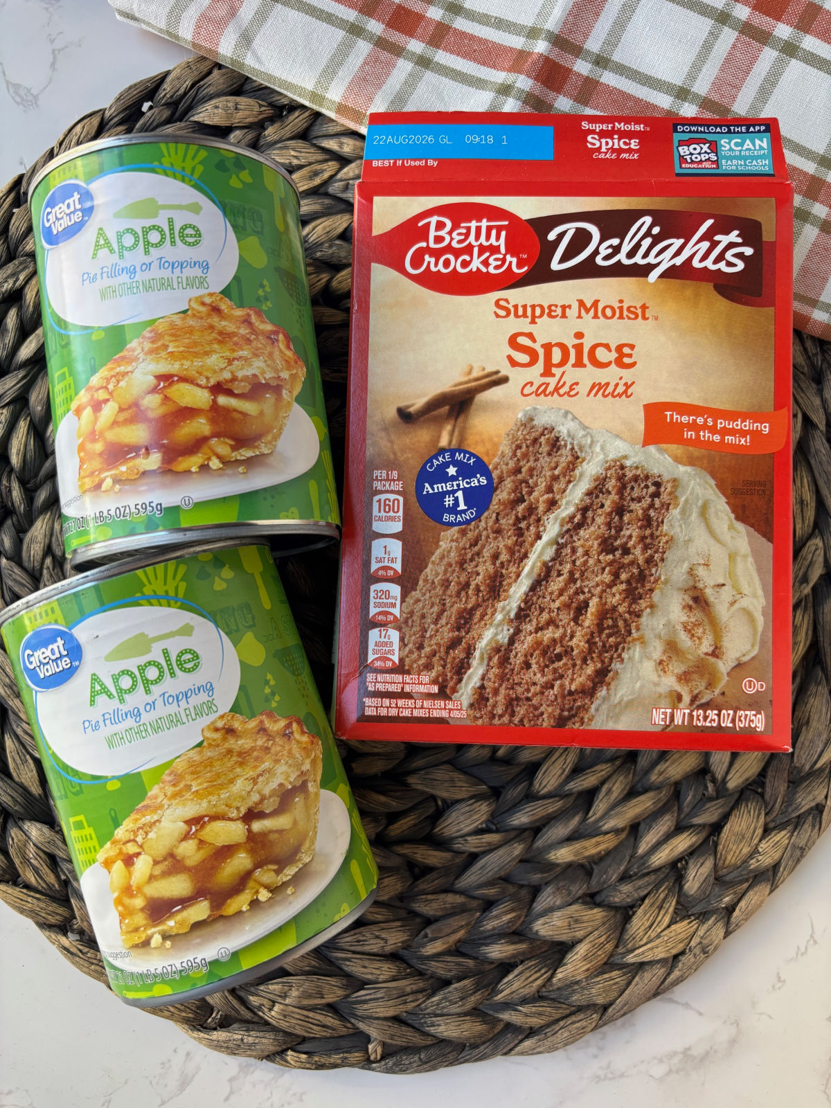 box of spice cake mix and apple pie filling. 