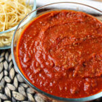 spaghetti sauce in a clear bowl.