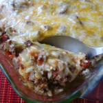 Mexican Rice Casserole recipe has a blend of spices your family will enjoy. Hamburger, rice and tomatoes make up this dish, with of course cheese!