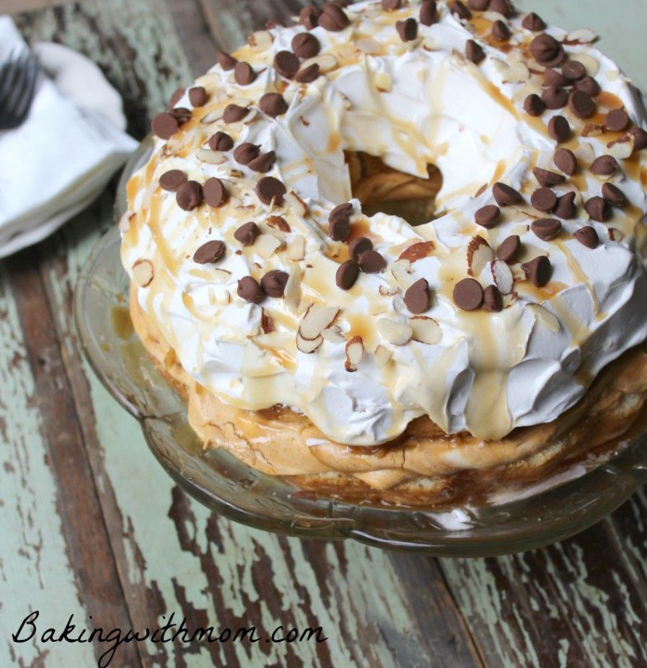 Pumpkin Cream Bundt Cake With Caramel Drizzle with almonds and chocolate chips on top