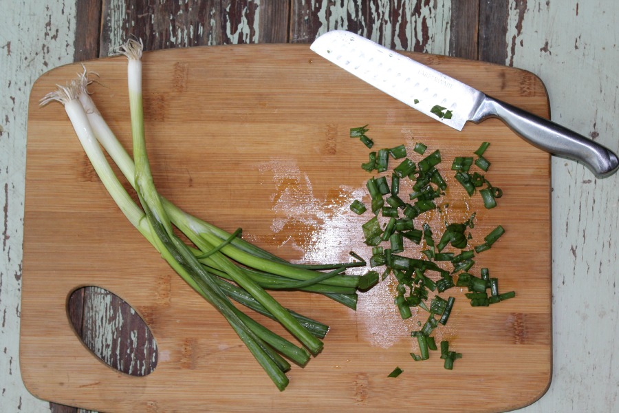 Green onions on a cutting board