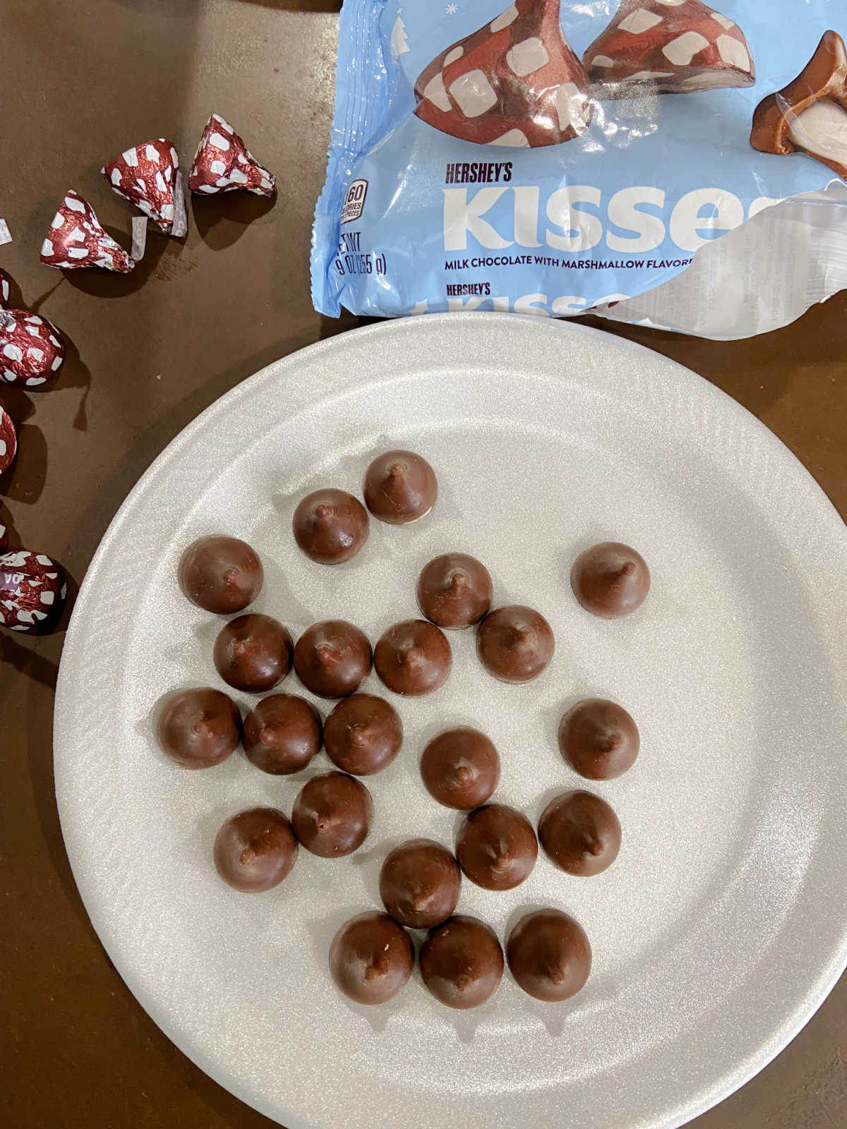 unwrapped Hershey hot cocoa kisses.