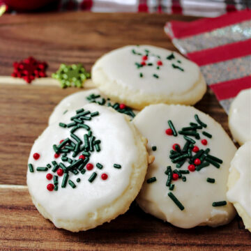 decorated sugar cookies on a board.