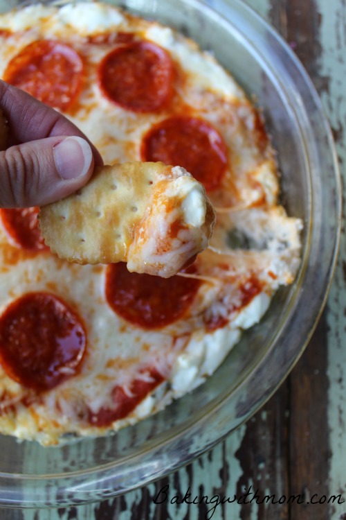 Hot Pizza Dip with pepperoni and cream cheese in a pie pan