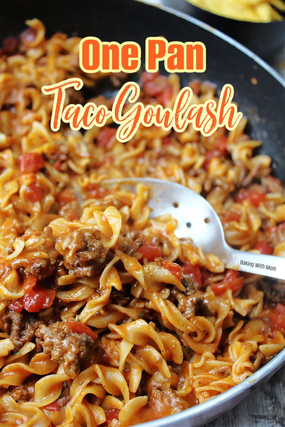 taco goulash in a large pan with a spoon. 