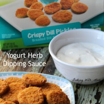 Farm Rich dill pickle box and yogurt dipping sauce in a white bowl