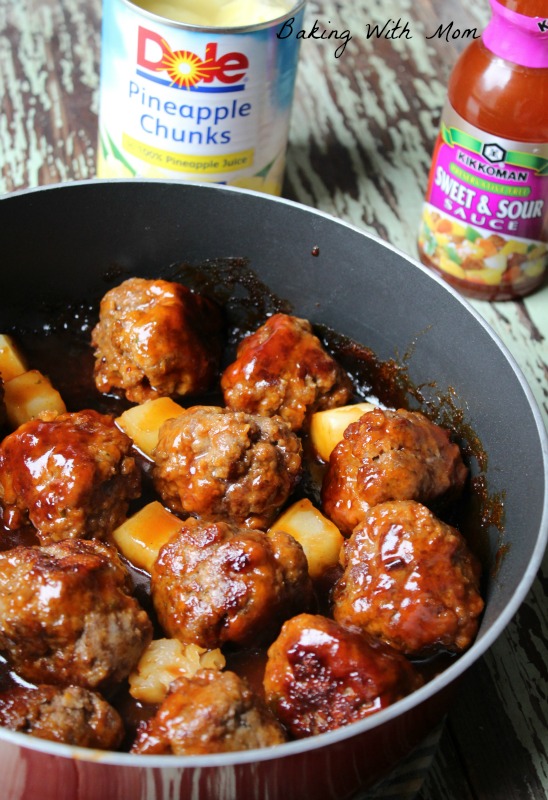 Sweet and Sour Meatballs in a large frying pan with pineapple