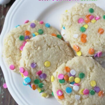 Gooey Birthday Cookies are full of sprinkles and fun. Great for a birthday party.Made with a cake mix and cream cheese