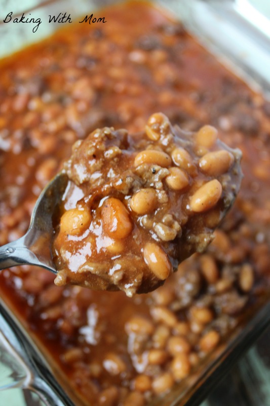 Close up of Best Baked Beans being held by a spoon. 