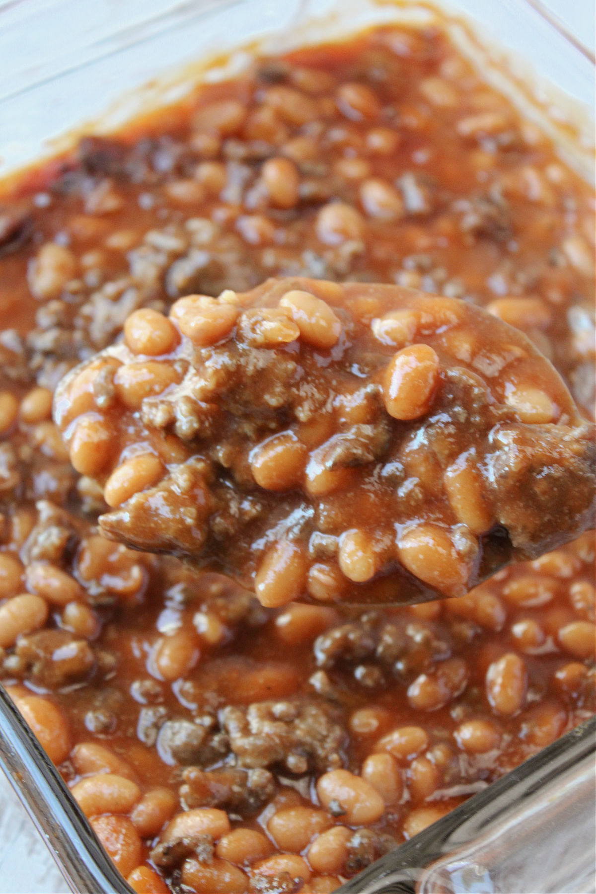 Best baked beans in a 9 inch square pan with a spoon. 