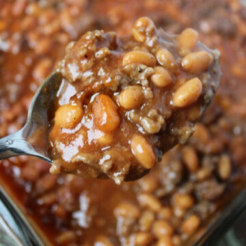 baked beans in a square casserole dish