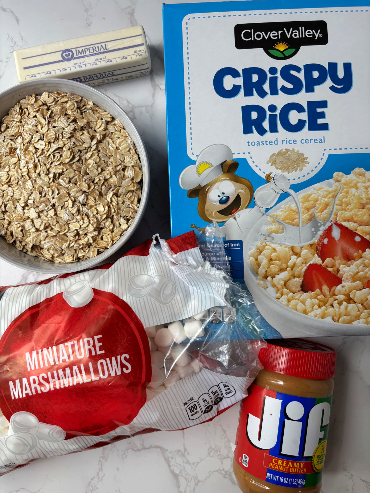 granola bar ingredients peanut butter, oatmeal, rice krispies, marshmallows and butter.