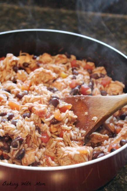 One Dish Mexican Chicken And Rice made in one pot, this meal has beans, tomatoes, chicken and rice for a healthier meal to feed your family