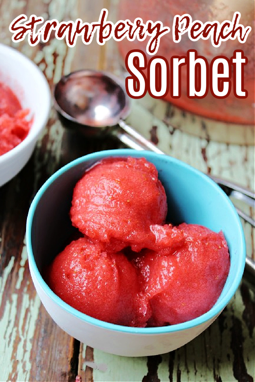 sorbet in a blue bowl with an ice cream scoop nearby. 