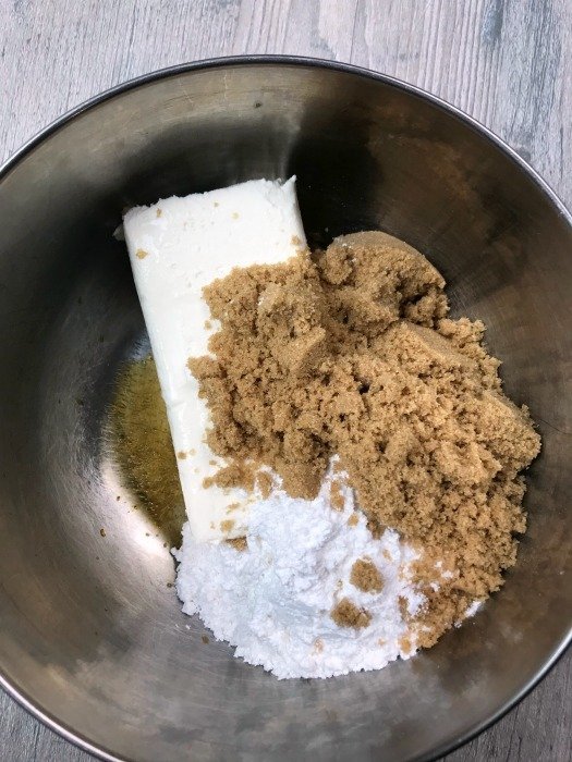 cream cheese, brown sugar in a silver bowl