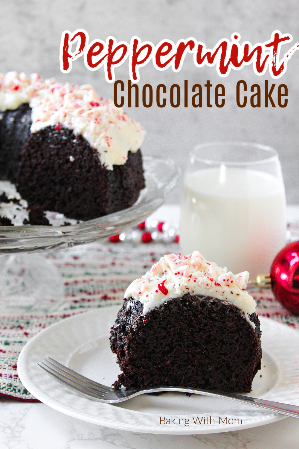 Peppermint Chocolate Cake on a white plate with a glass of milk. 