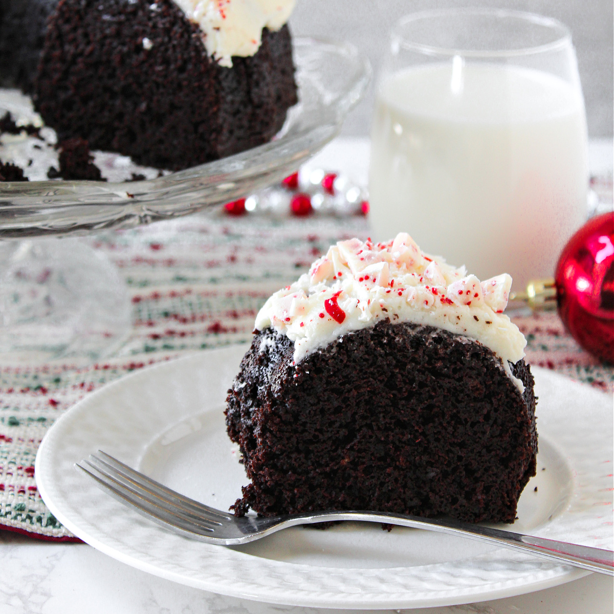 peppermint chocolate cake on a white plate.