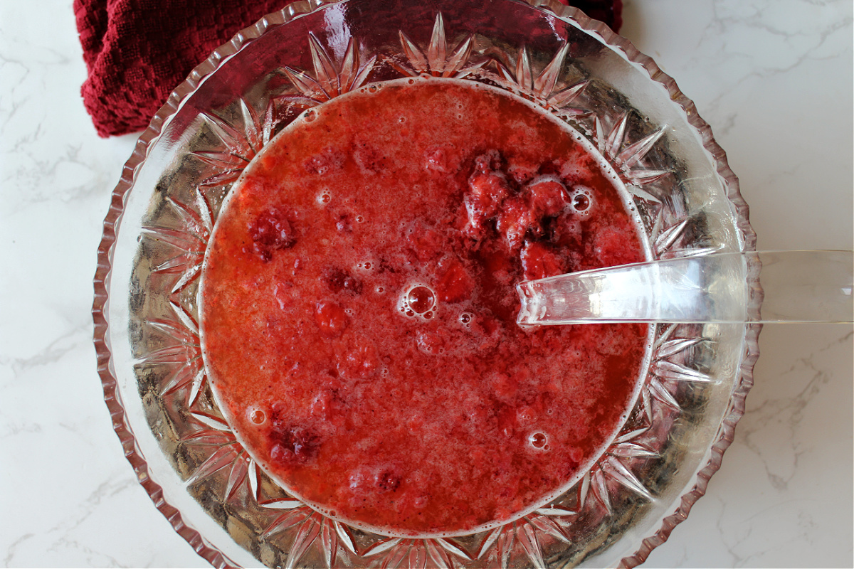 strawberry punch in a clear bowl.
