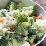 Ranch Broccoli Cauliflower Salad with veggies, cheese, ranch dip. A side dish to feed your family and take on picnics