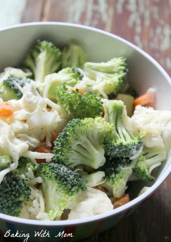 Ranch Broccoli Cauliflower Salad with veggies, cheese, ranch dip. A side dish to feed your family and take on picnics