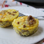sausage egg muffins on a white plate.