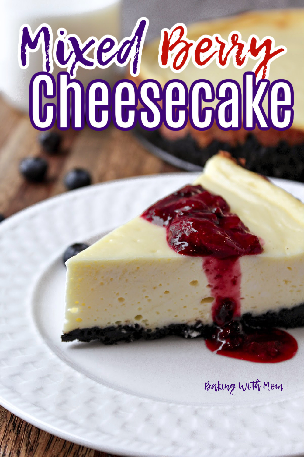 mixed berry cheesecake with berries drizzled on top. 