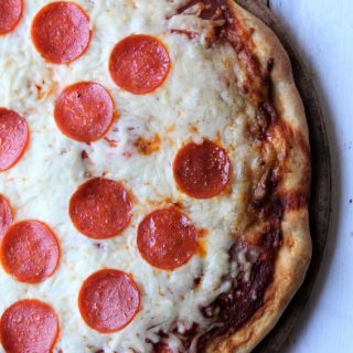 Grilled Pizza On A Stone with cheese and pepperoni
