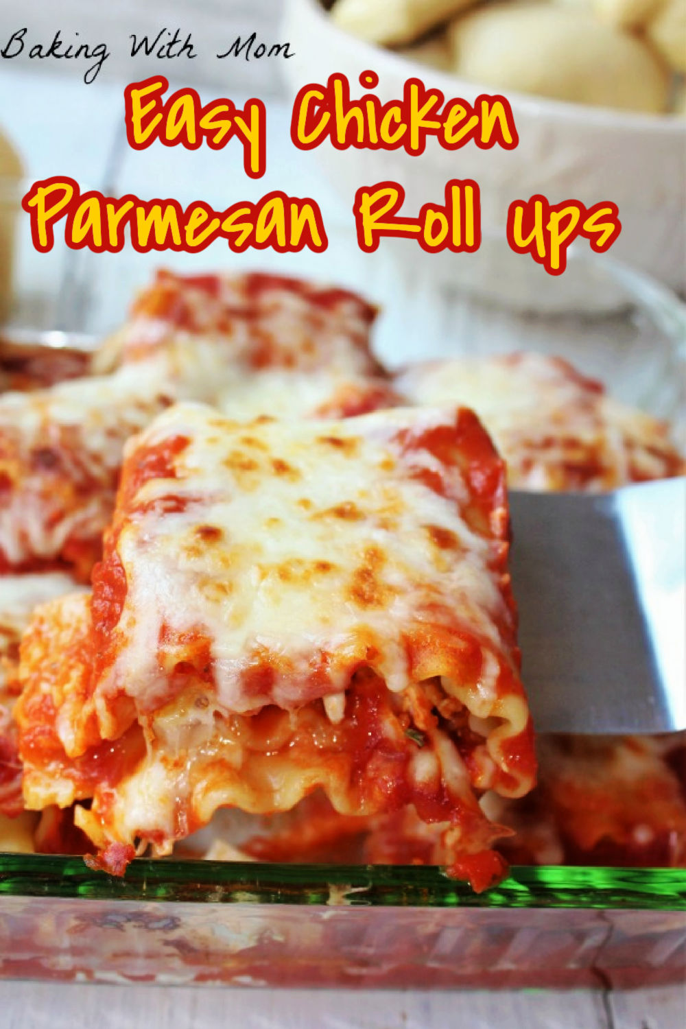 chicken parmesan roll ups with melted cheese. 