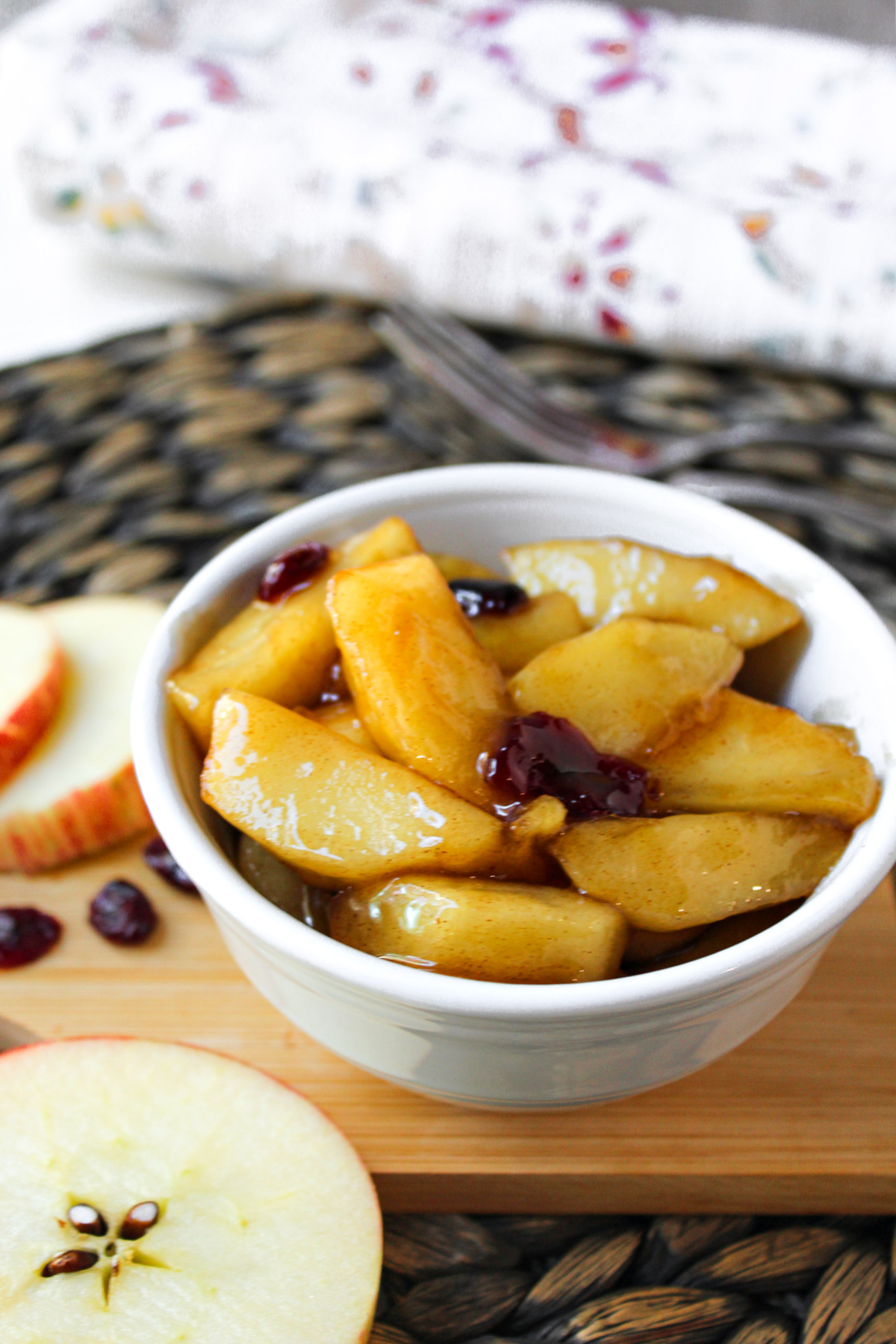 fried apples on a wooden board.