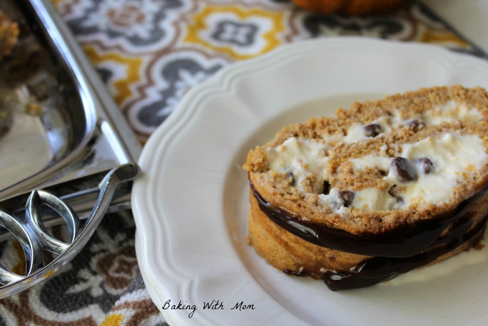 Pumpkin pie ice cream roll slice on a white plate