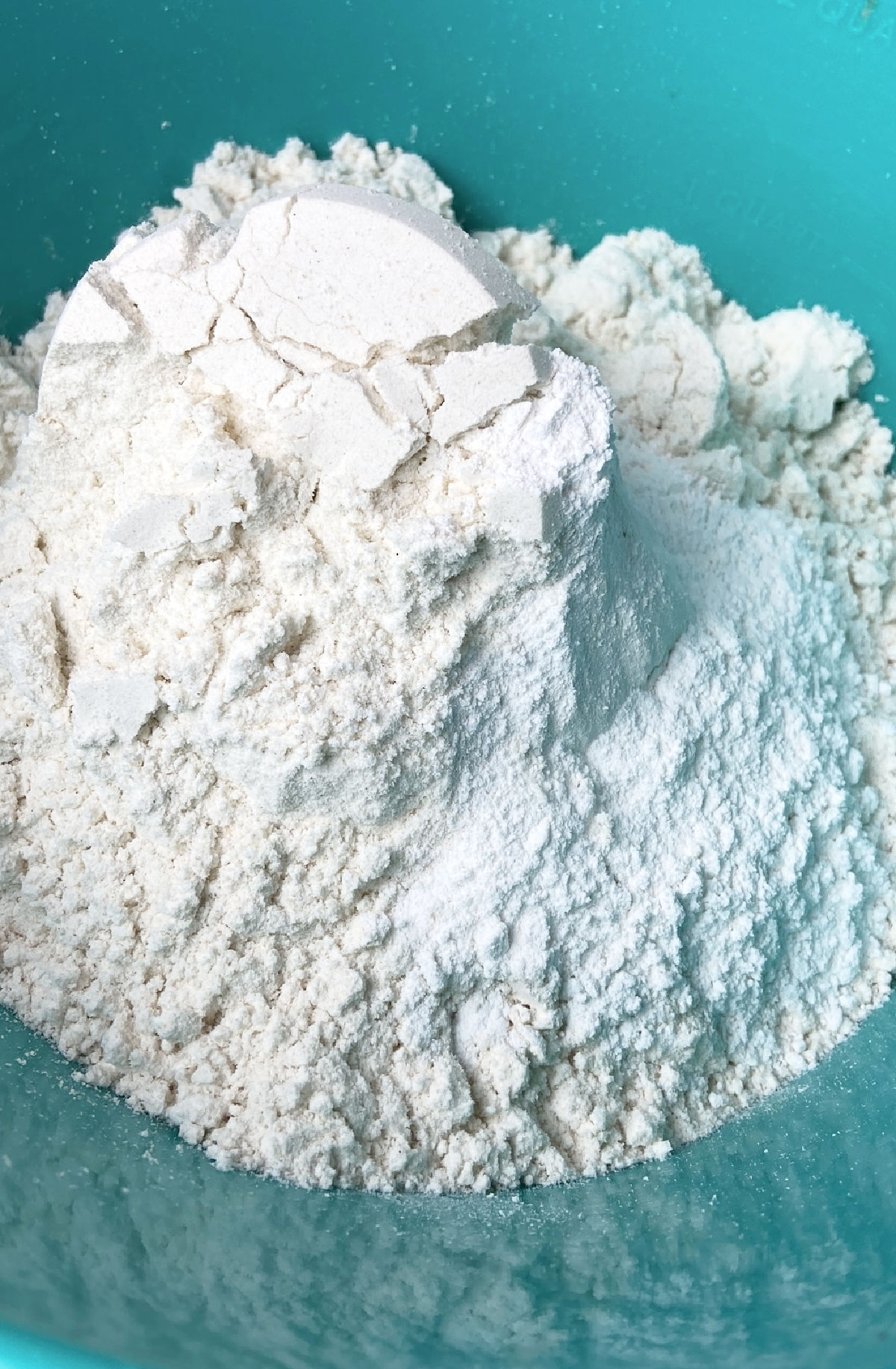 flour in a blue bowl. 