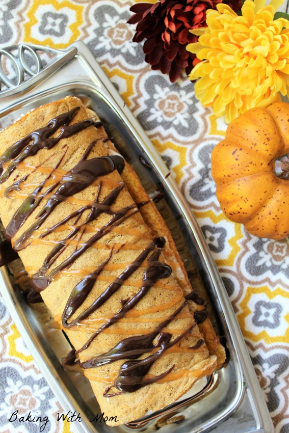 Pumpkin Pie Ice Cream Roll drizzled with caramel and chocolate sauce