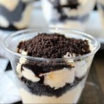 Oreo Ice Cream Parfaits with layers of vanilla ice cream, Oreo Cookies and chocolate. Make for your family or for guests #party #graduation #chocolate #icecream #dessert #memorialday