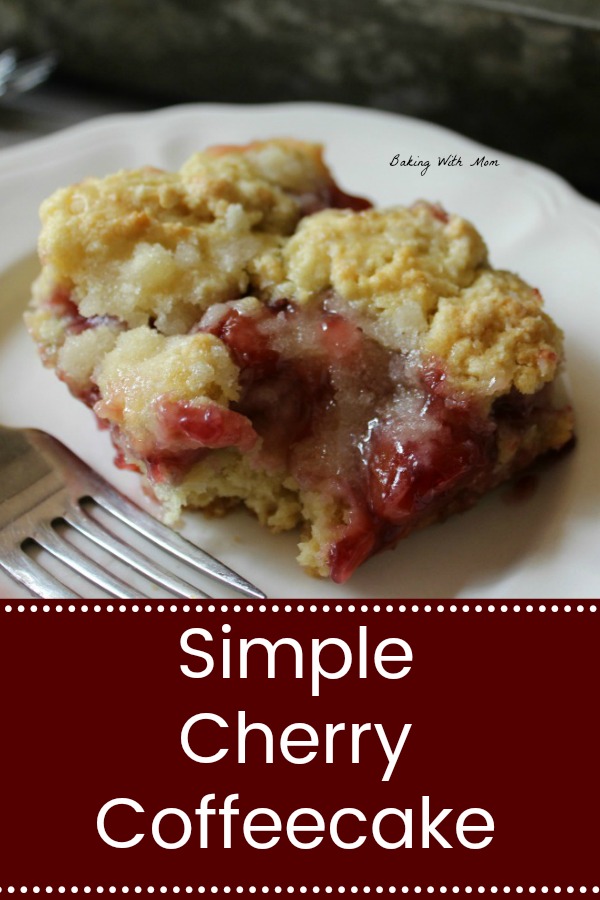 Simple Cherry Coffee Cake with a bite taken out on a white plate