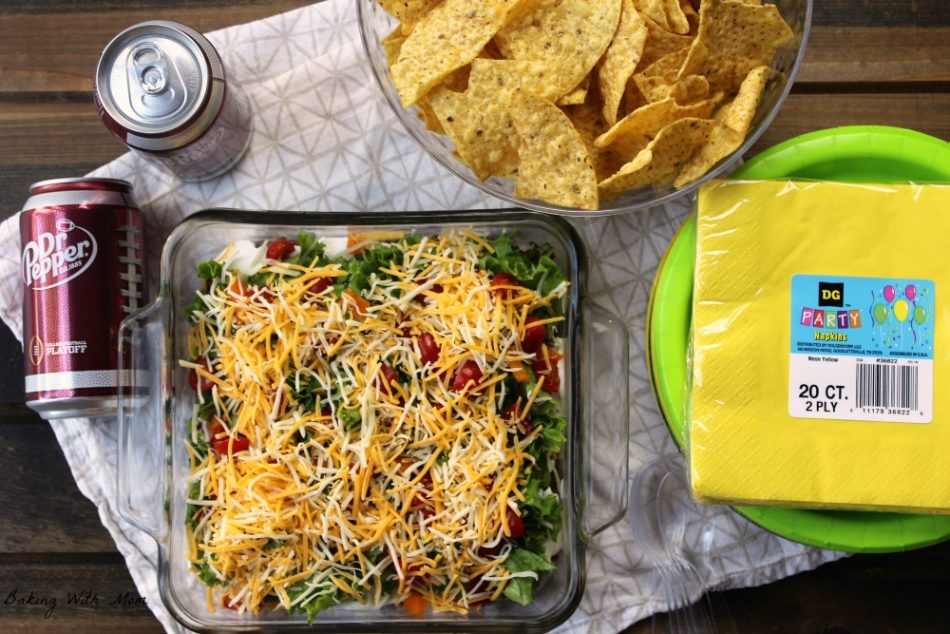 Dr Pepper cans, taco dip and chips