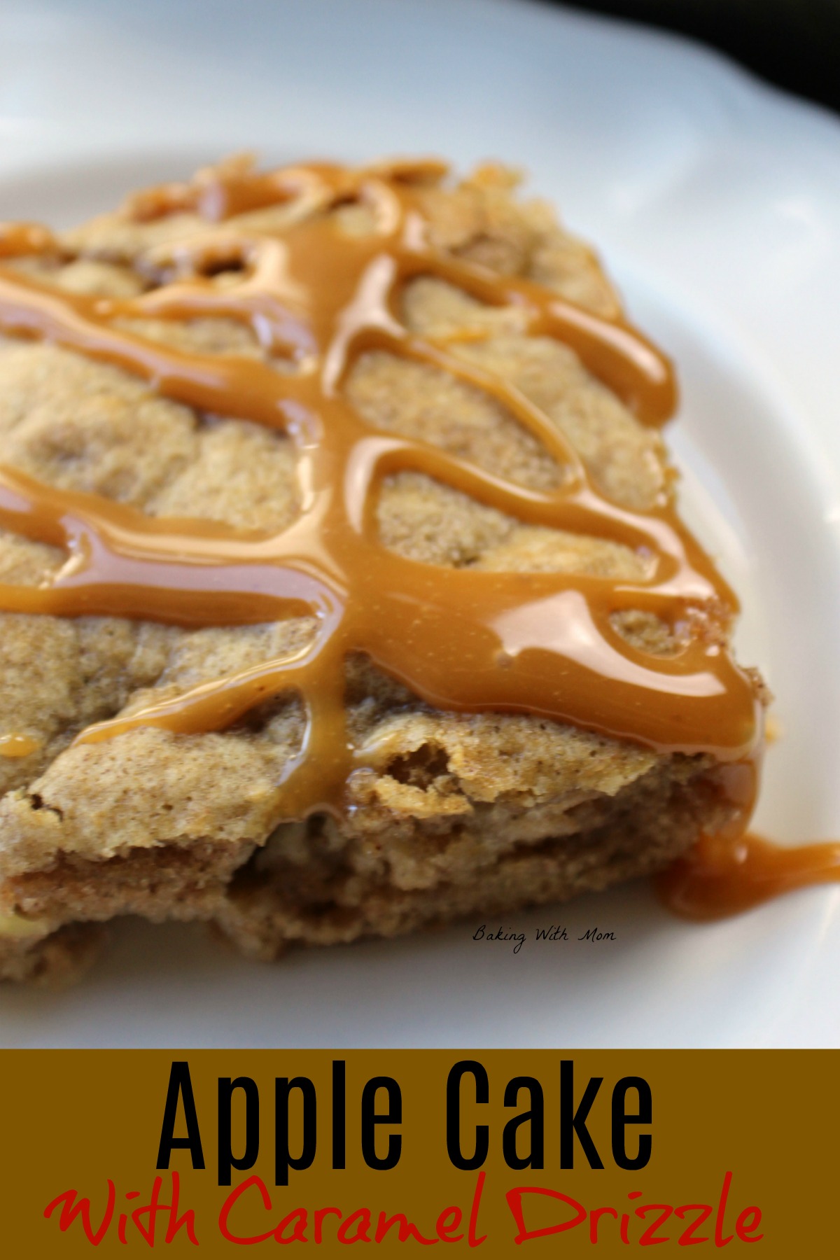 A piece of apple cake on a white plate