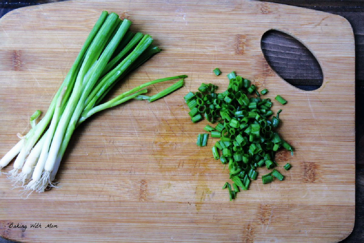 chopped onions on a cutting board. 