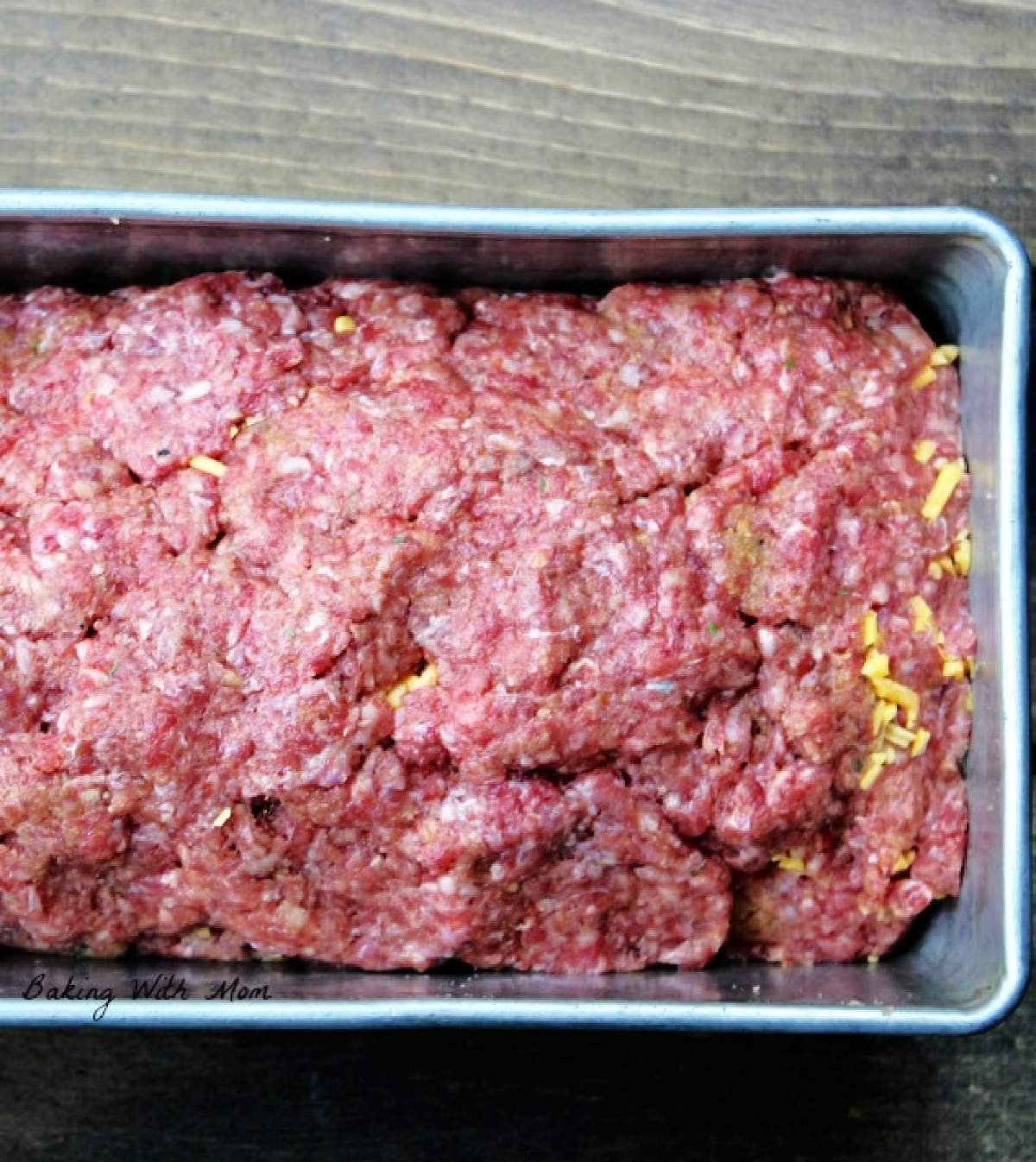 meatloaf uncooked in a pan. 