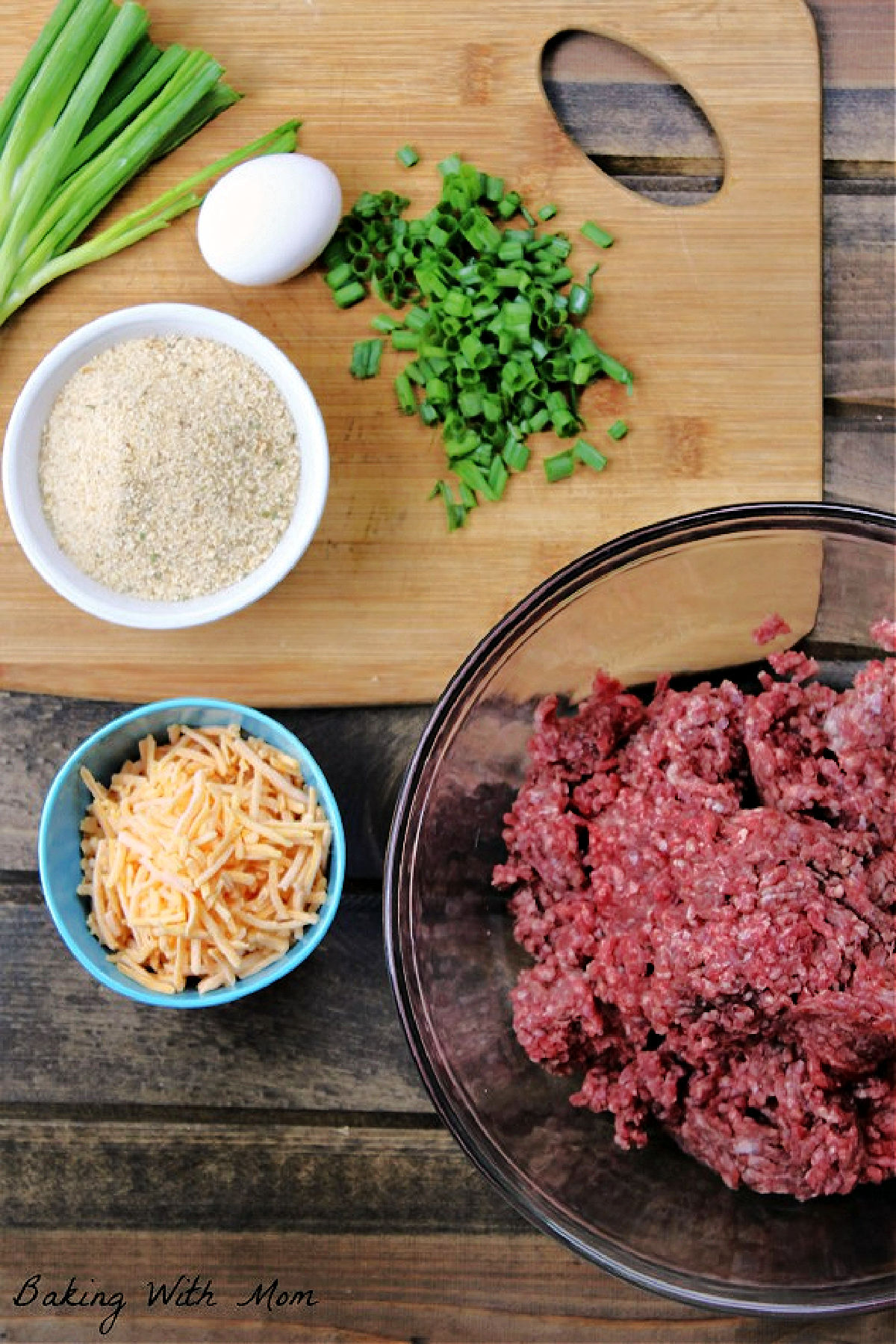 meatloaf ingredients of ground beef, green onions, cheese. 