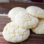 gooey butter cookies on a brown tray.