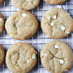 soft and chewy white chocolate chip cookies on a cooling rack.