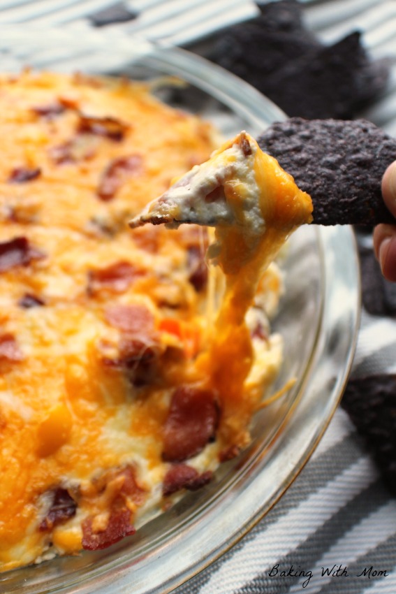 Hot Cheesy Sweet Pepper Dip with Blue Tortilla Chips 