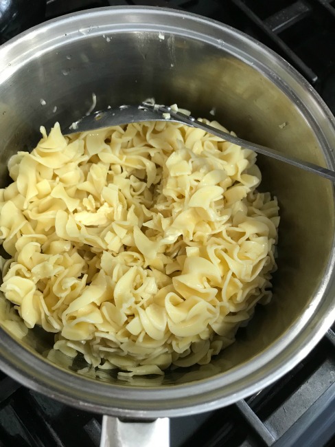 Cooked egg noodles in a pot