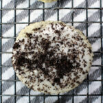cookies and cream cookie with frosting and cookie crumbles.