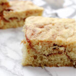 piece of coffee cake on a marble board.